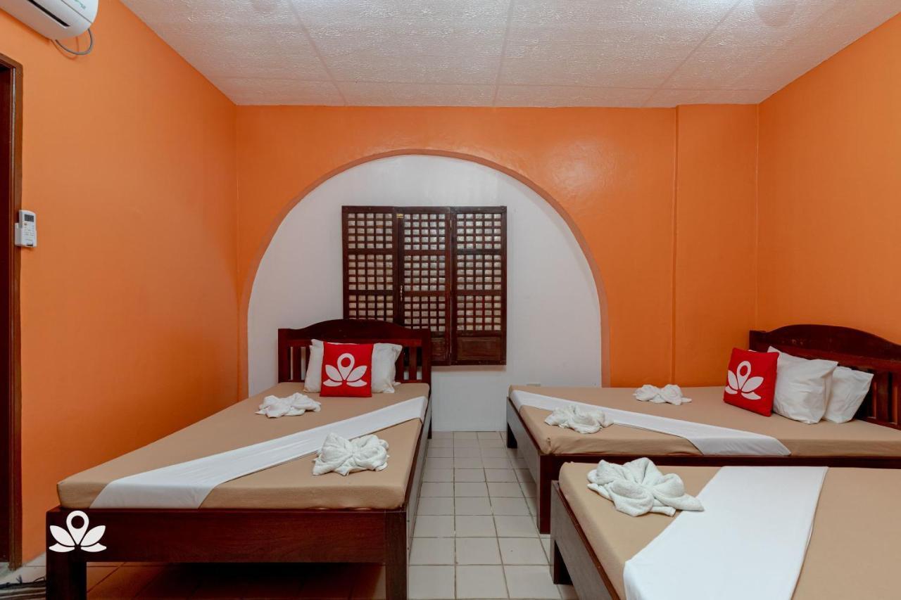 Zen Rooms Calle Crisologo Виган Экстерьер фото